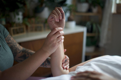 Marissa performing an arm massage